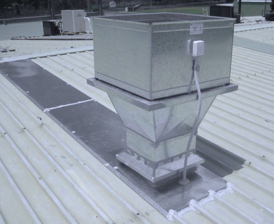 Air conditioning equipment atop a modern building - aerial/drone